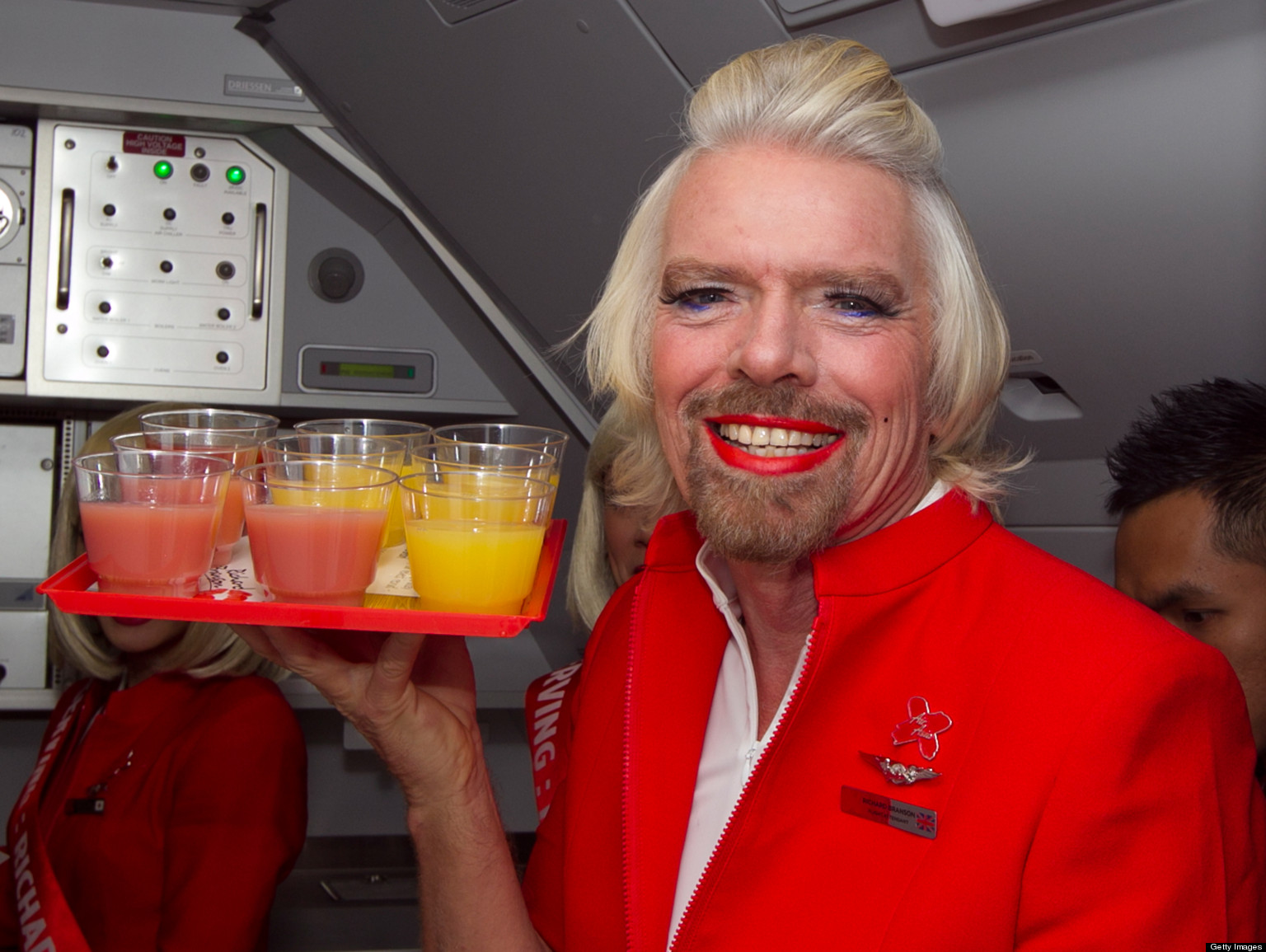 Richard Branson as a stewardess on Virgin Australia at www.lyricmarketing.com