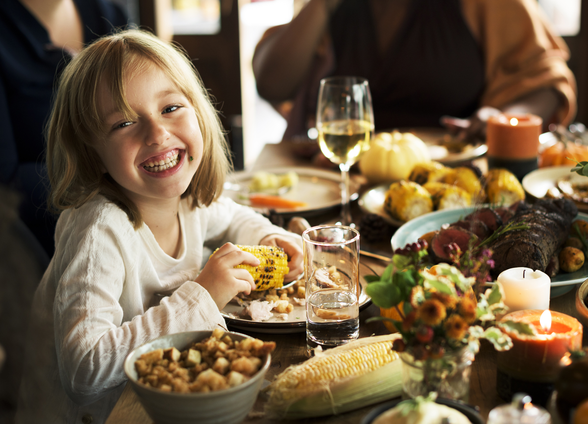make a decision and commit to something young girl eating thanksgiving dinner at a family table