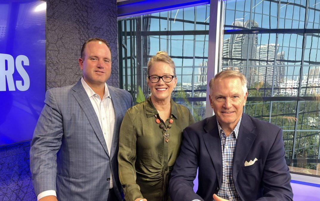 sandy and marc with brooks kelly on the set of the insiders podcast