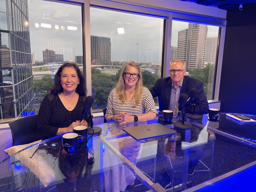 sandy hibbard on the set of the INSIDERS with her co-host marc miller and their guest renae quigley