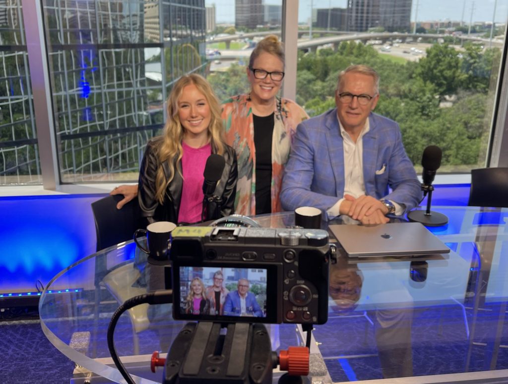 sandy and her guest harlee owen and cohost marc miller on the set of the INSIDERS on real estate and marketing